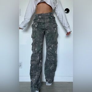 Distressed Dark Green Cargo Pants with White Paint Splatter